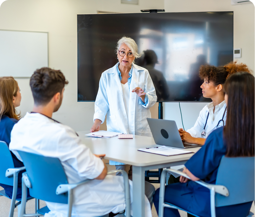 Healthcare professionals discussing around a table